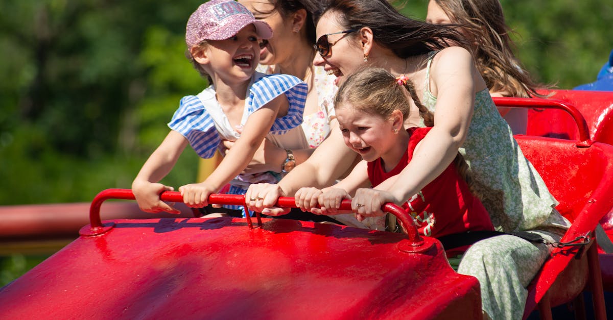 Joyful family experiencing excitement and exhilaration on a roller coaster ride, full of smiles and laughter.