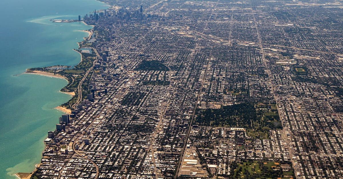Stunning aerial panorama of Chicago revealing the city skyline, Lake Michigan, and urban sprawl.
