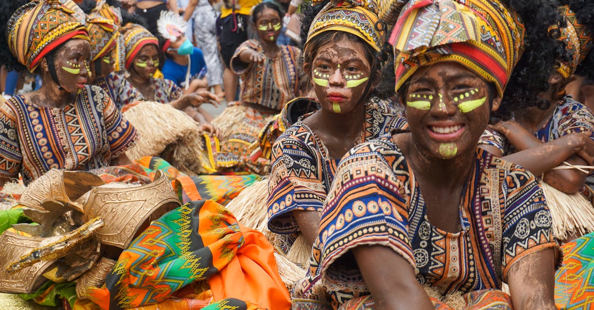 Vibrant celebration of the Dinagyang Festival featuring traditional costumes and tribal performances in Iloilo City, Philippines.
