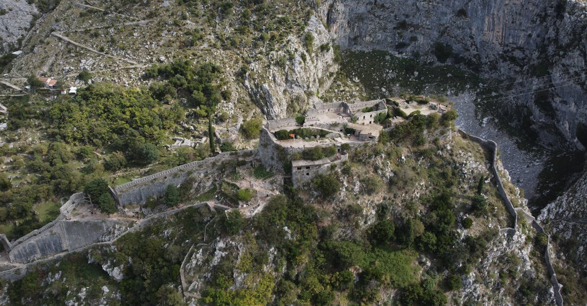 Stunning view of ancient fortification in Kotor, Montenegro from above. Perfect for travel and history themes.