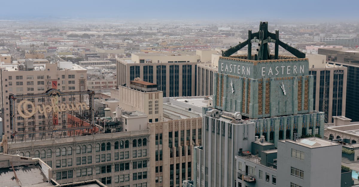 Aerial view of the iconic Eastern Columbia Building and surrounding cityscape in downtown Los Angeles.