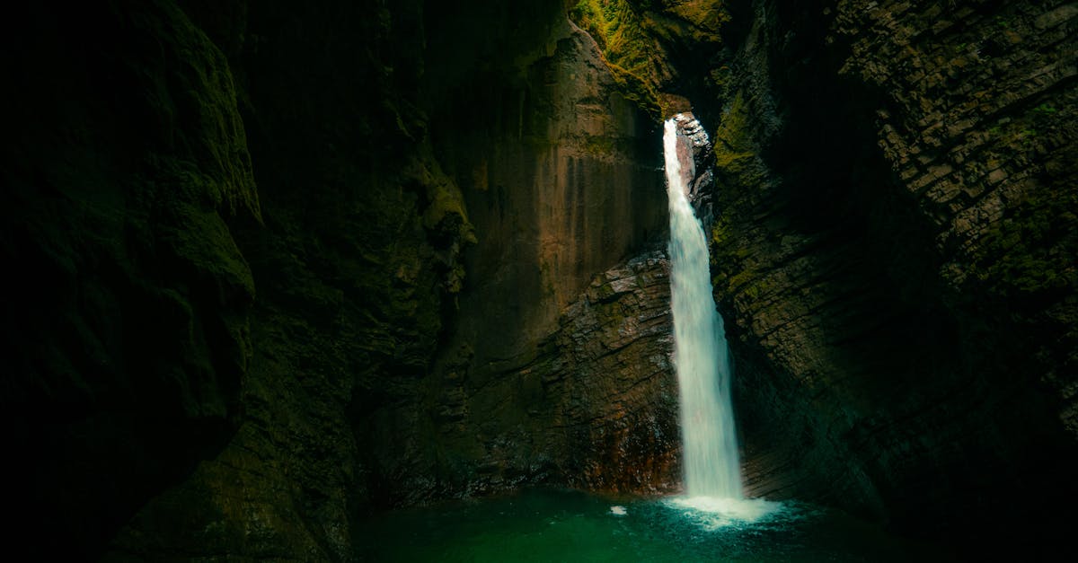 Breathtaking waterfall flowing through the rocky Soča Gorge in Tolmin, Slovenia.