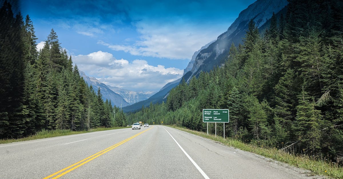 Picturesque highway scene with mountains and forest in British Columbia, Canada.