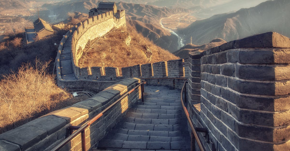 A stunning view of the Great Wall of China, showcasing its architectural beauty and historical significance at sunrise.