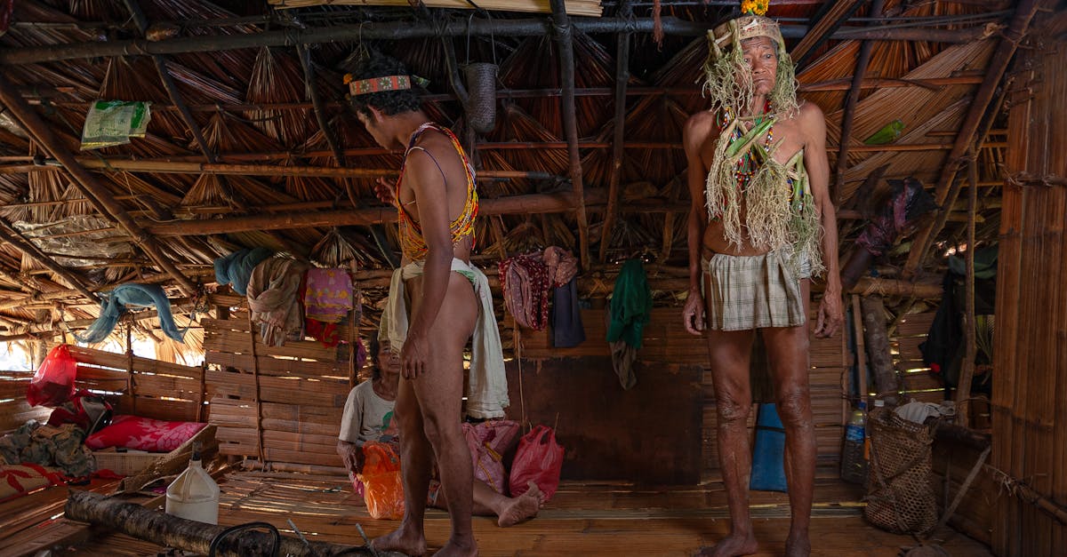 Explore inside an indigenous home featuring traditional attire and cultural elements.