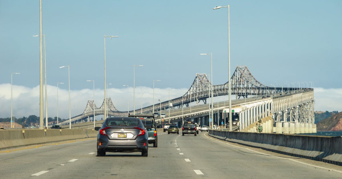 Vehicles travel on a sunny day across the Richmond-San Rafael Bridge.