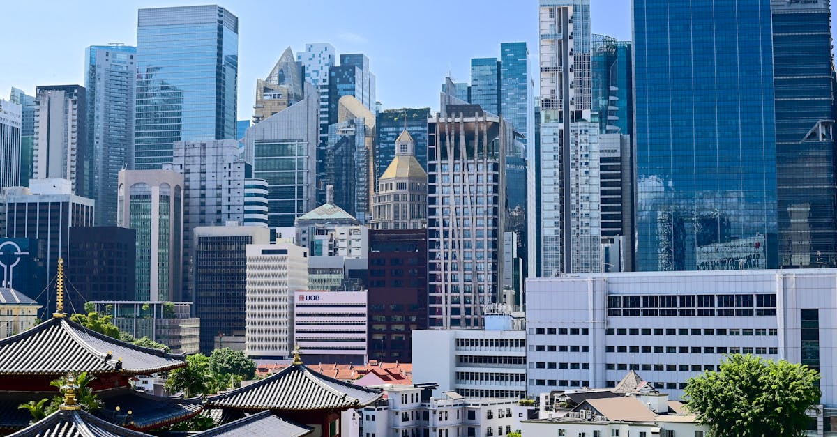 Stunning view of Singapore's downtown skyscrapers and iconic architecture under a clear blue sky.
