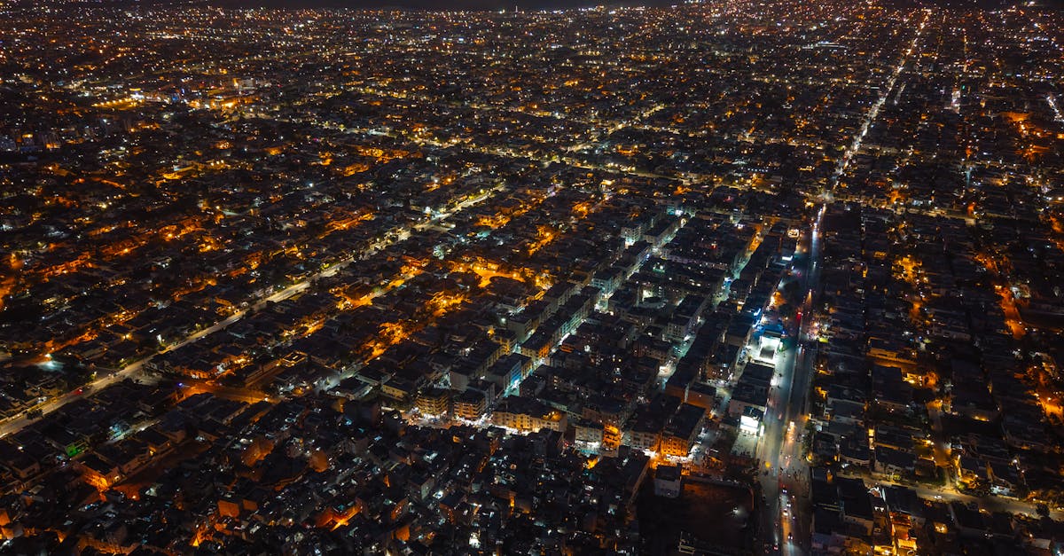 Aerial night shot of Karachi, Pakistan, showcasing the vibrant city lights and urban sprawl.