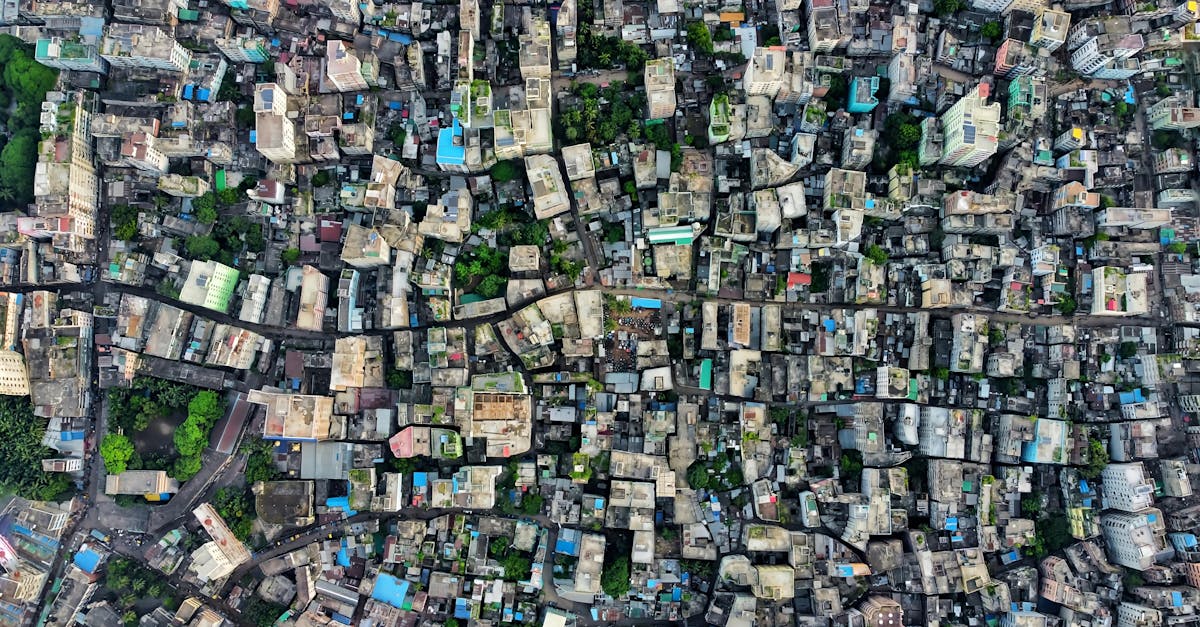Aerial shot of a densely packed urban cityscape highlighting architecture and city planning.