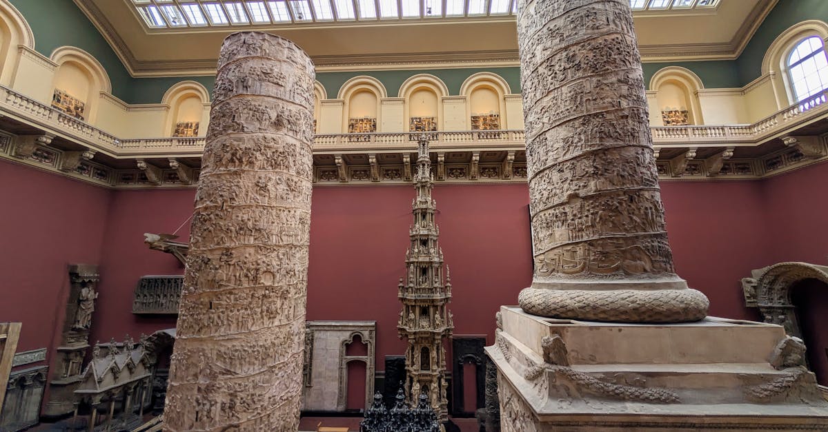 Intricate classical columns displayed in a museum's grand interior.