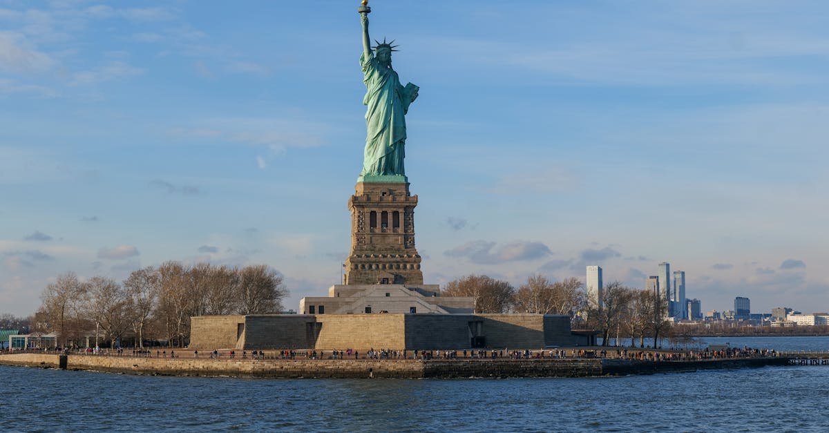 Capture of the Statue of Liberty with the New York City skyline in the background.