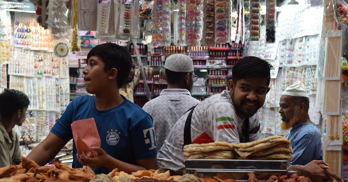 Explore the lively and colorful ambiance of Dhaka's night market during Ramadan, bustling with traditional street food and cultural vibrancy.