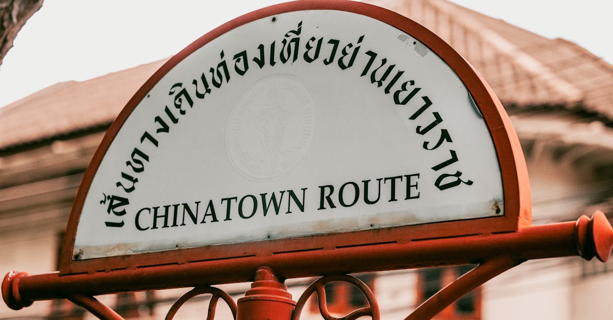 Explore the iconic Chinatown Route sign in Bangkok, showcasing rich cultural heritage.
