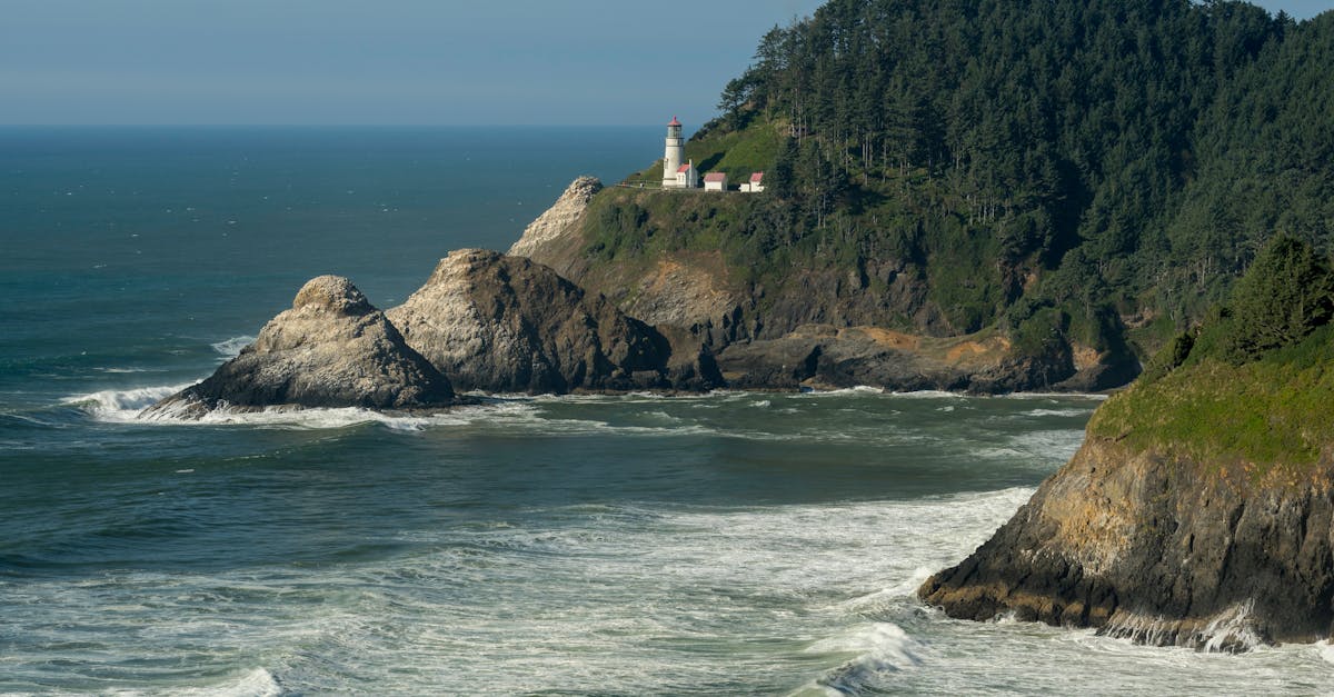 Scenic view of Heceta Head Lighthouse overlooking rocky Pacific coast in Florence, Oregon.