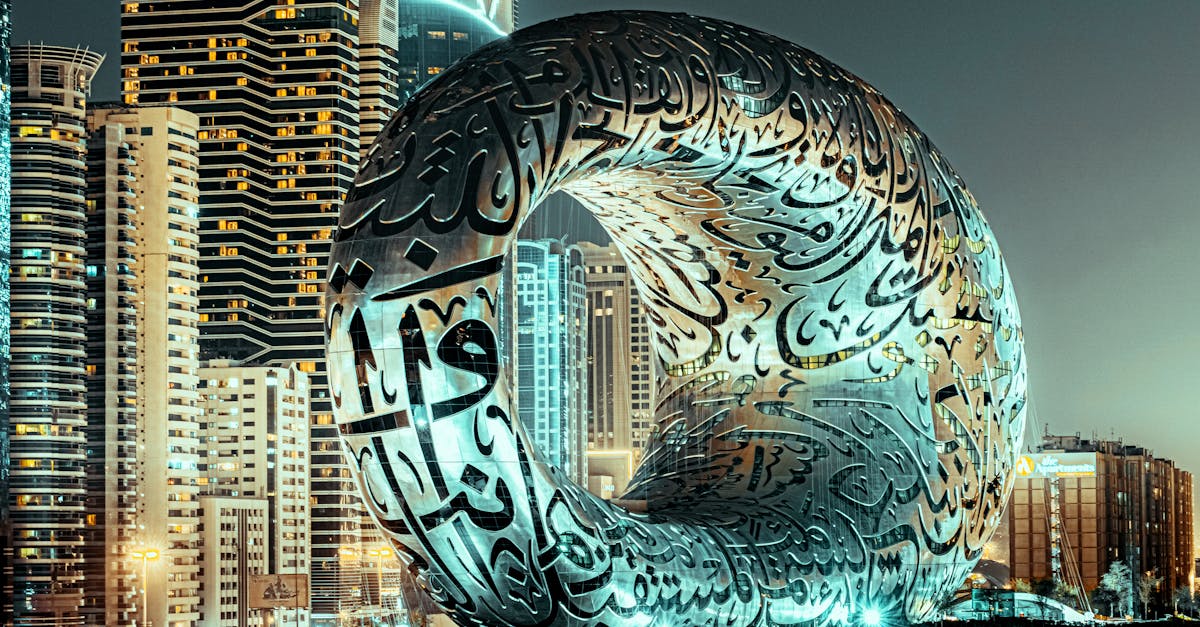 Stunning view of Dubai's Museum of the Future amidst city skyscrapers at night.
