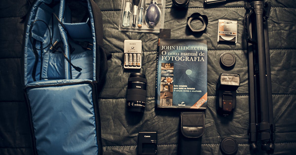 A flat lay of essential camera equipment and accessories for photography.