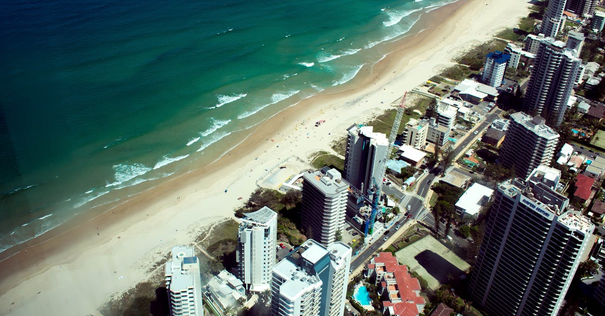 A stunning aerial view of Gold Coast's beachfront skyline, showcasing the azure ocean and sandy shores.