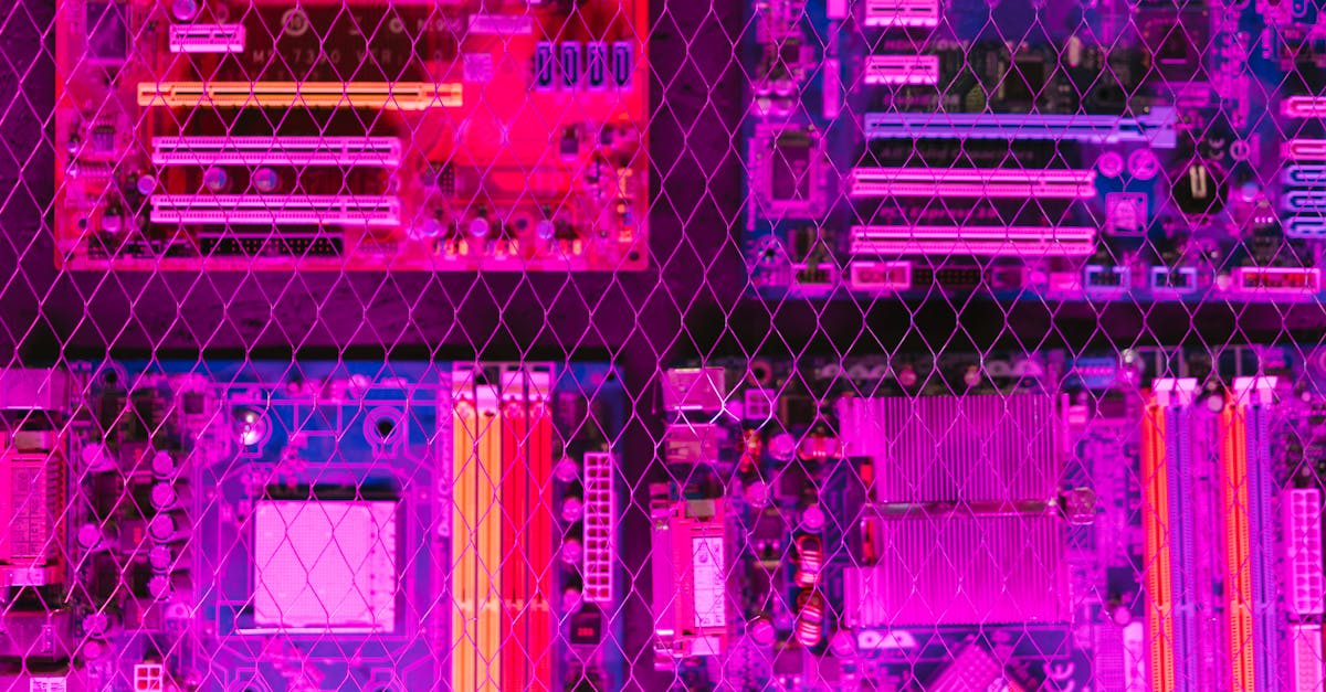 A vibrant image showcasing various circuit boards through a wire mesh, highlighting electronics and technology.