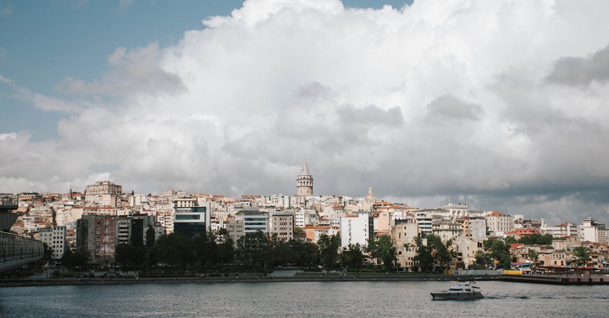 A stunning aerial view of Istanbul with the iconic Galata Tower framed by a cloudy sky.