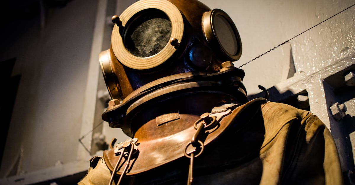 A vintage diving suit displayed in a museum, reflecting historical maritime exploration.